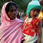 indische Frau mit Kind